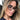 Anti-blue light cat eye glasses with full-frame elegance on woman.